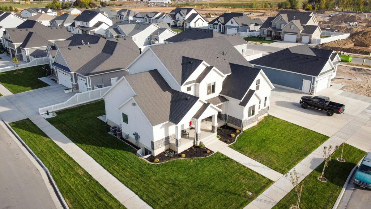 Aerial view of Calgary residential homes with asphalt shingle roofs